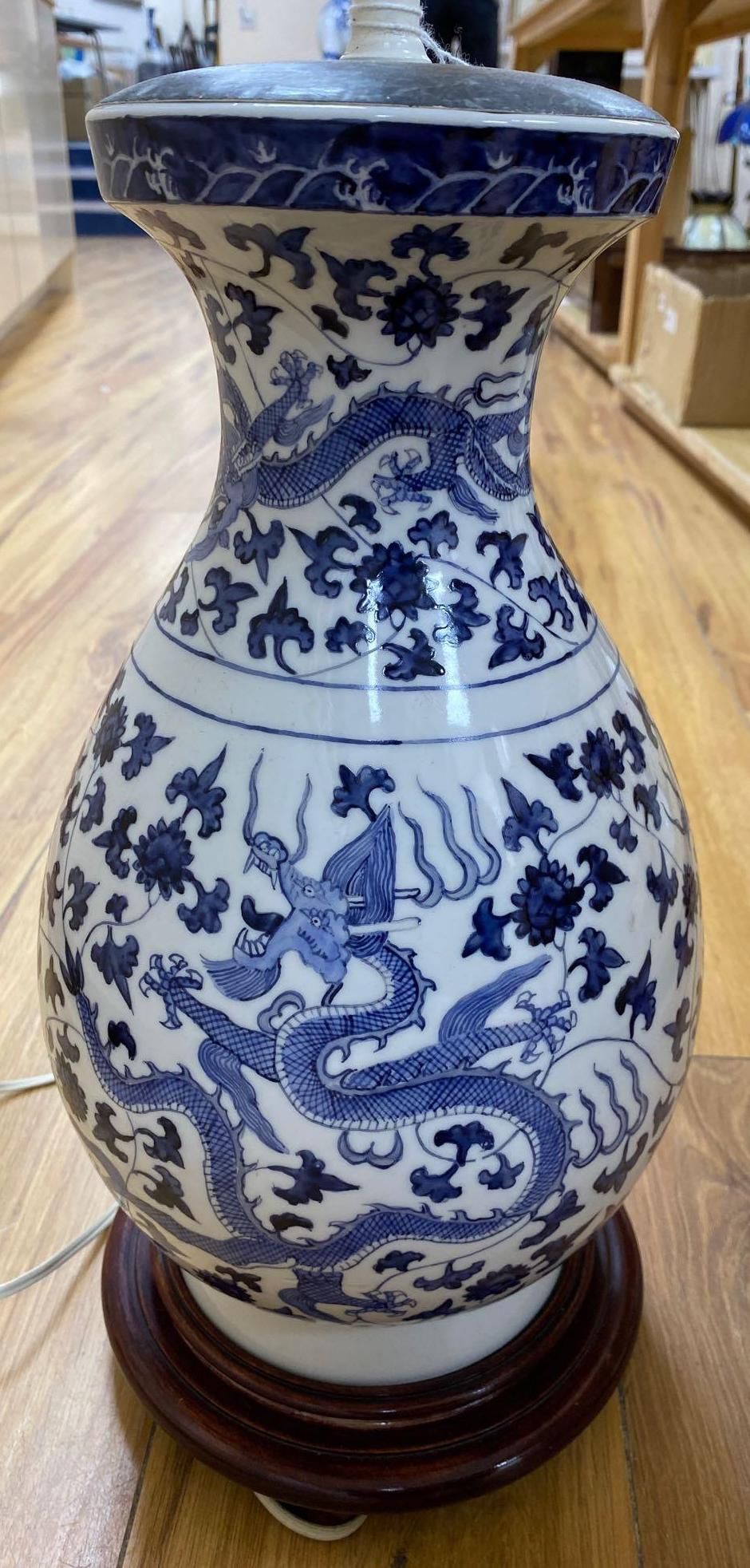 A modern Chinese blue and white dragon vase / table lamp